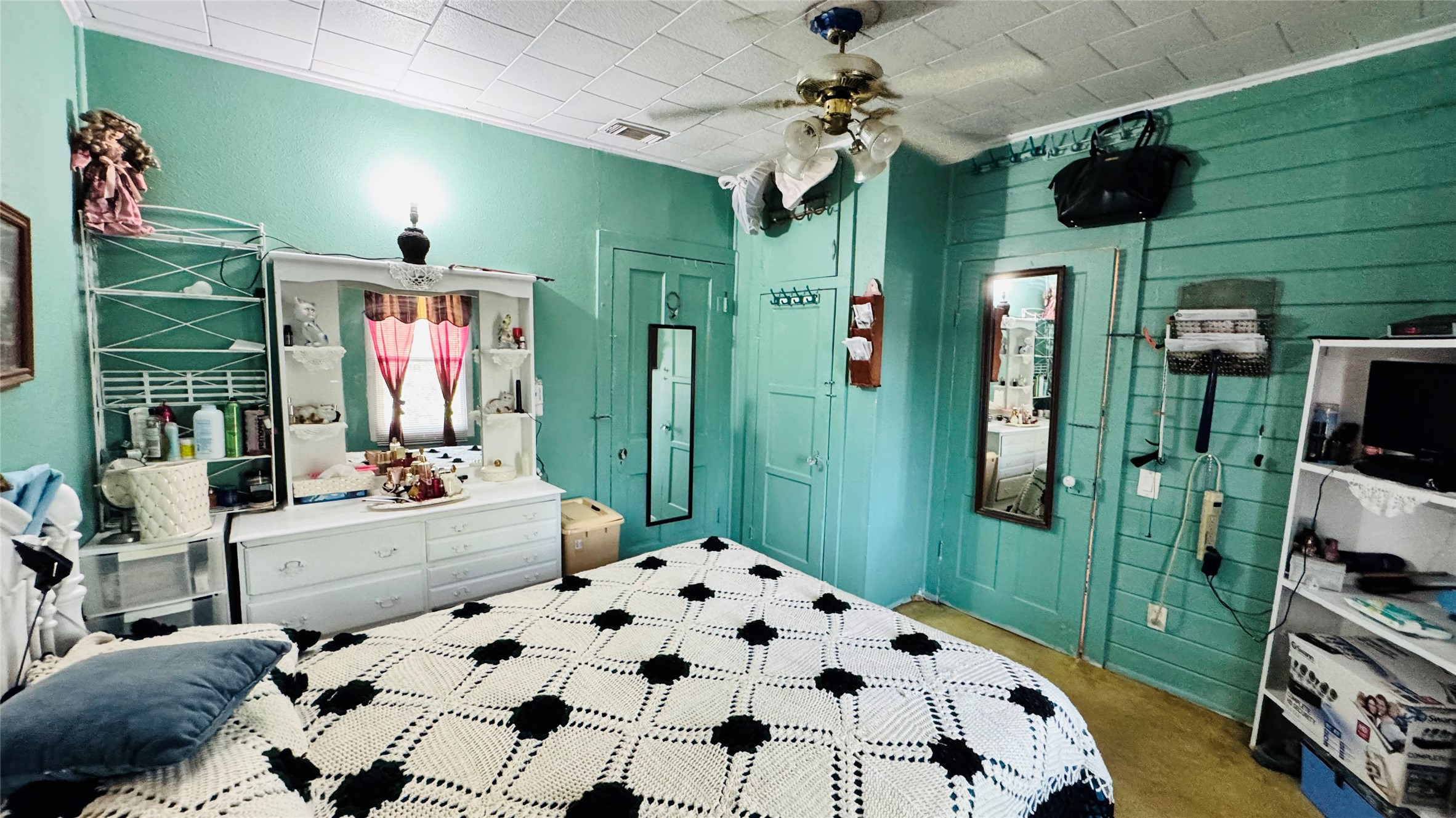 1604 Pine Street Georgetown, TX 78626 - Photo 5 of 13 a bedroom with furniture and a flat screen tv