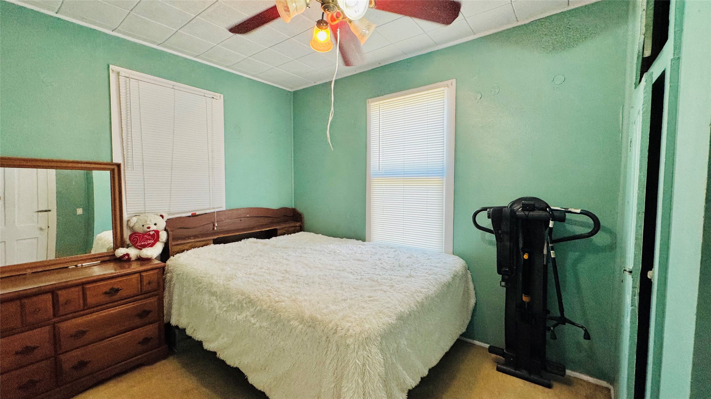 1604 Pine Street Georgetown, TX 78626 - Photo 8 of 13 a bedroom with a bed and a dresser
