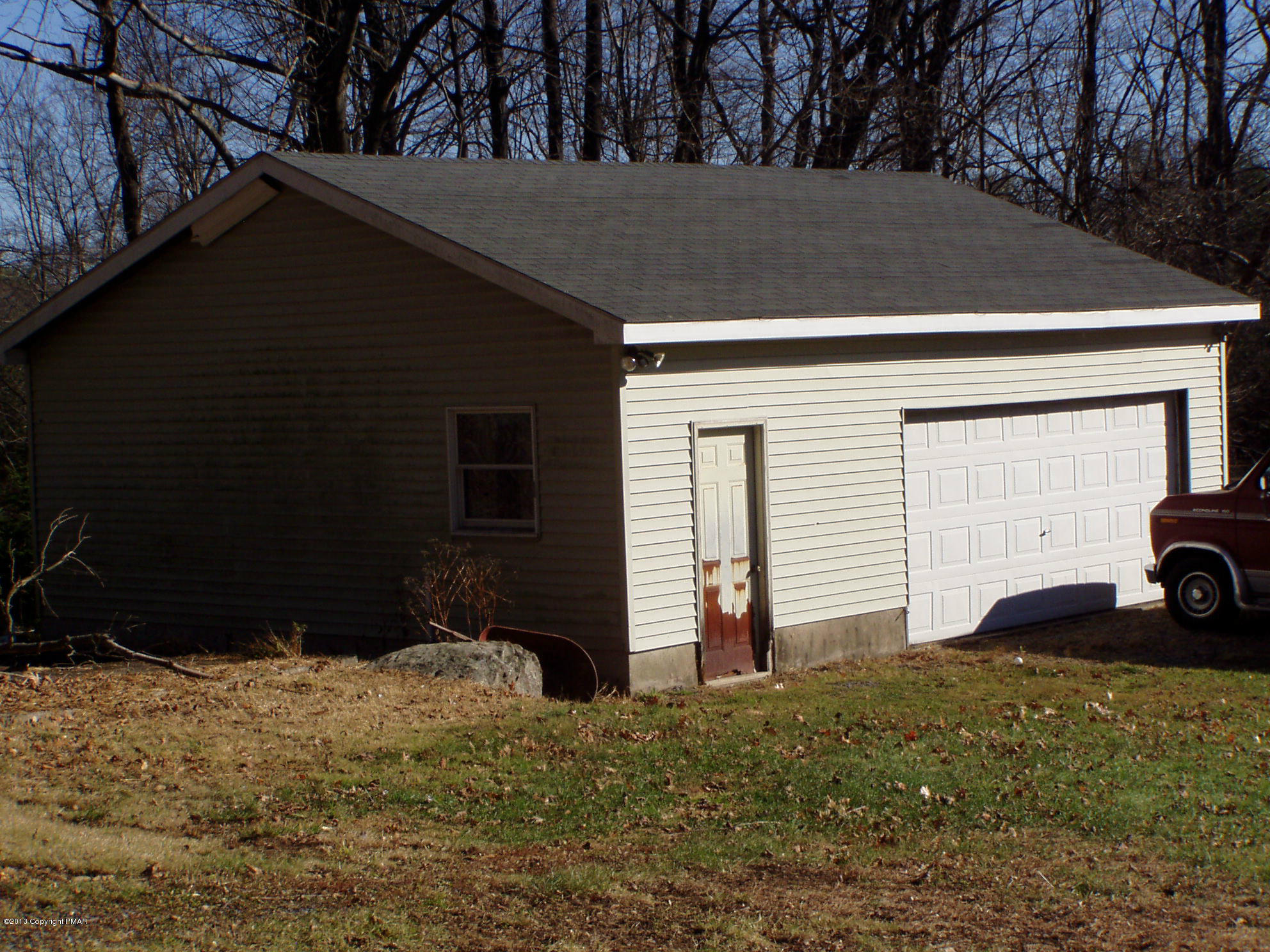 340 Summit Road Swiftwater, PA 18370 - Photo 10 of 16 a view of a house with a yard