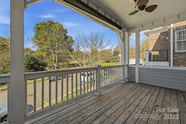 a view of a livingroom with kitchen and furniture