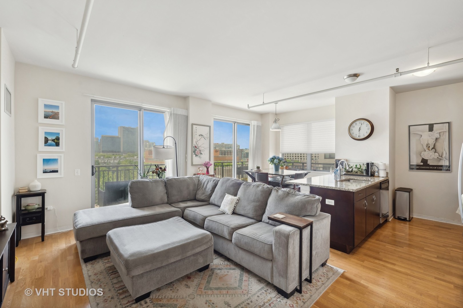 437 West Division Street, Unit 618 Chicago, IL 60610 - Photo 4 of 17 a living room with furniture and a large window