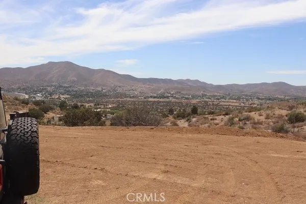 a view of lake with mountain