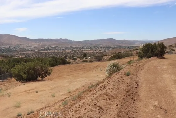 a view of mountains and valleys
