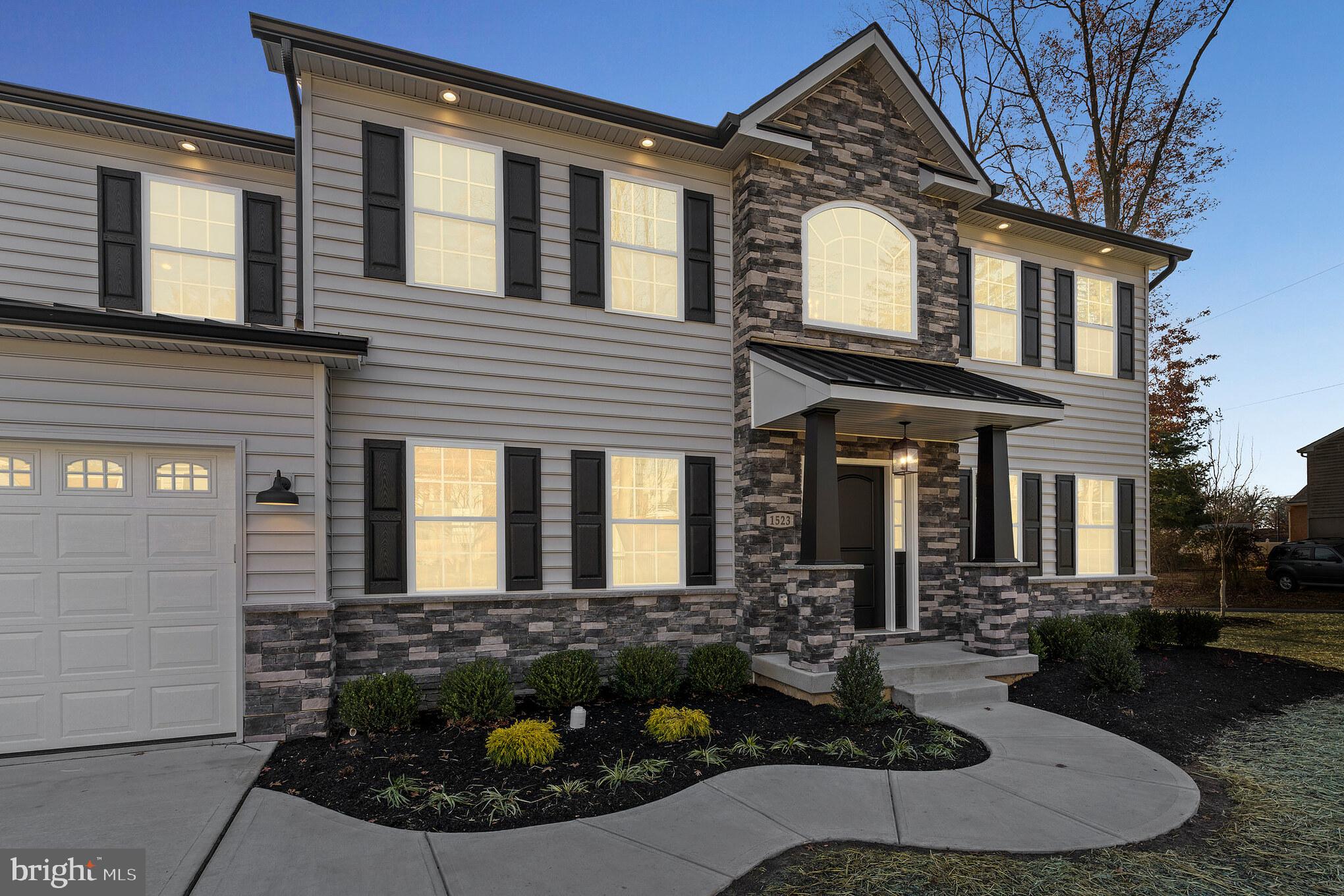 1021 West Maple Avenue Langhorne, PA 19047 - Photo 2 of 37 a view of a house with potted plants