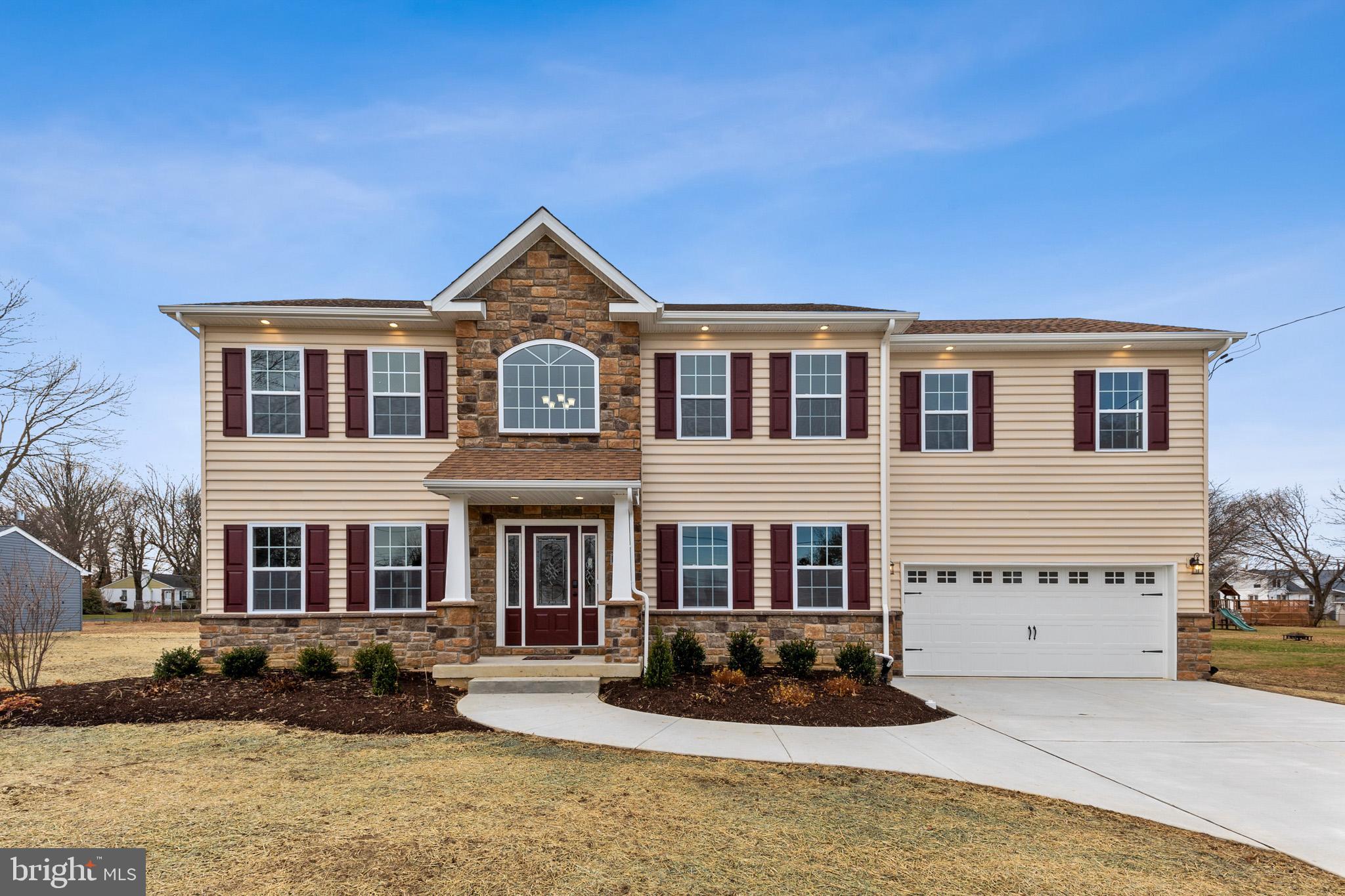 1021 West Maple Avenue Langhorne, PA 19047 - Photo 31 of 37 a front view of a house with a yard
