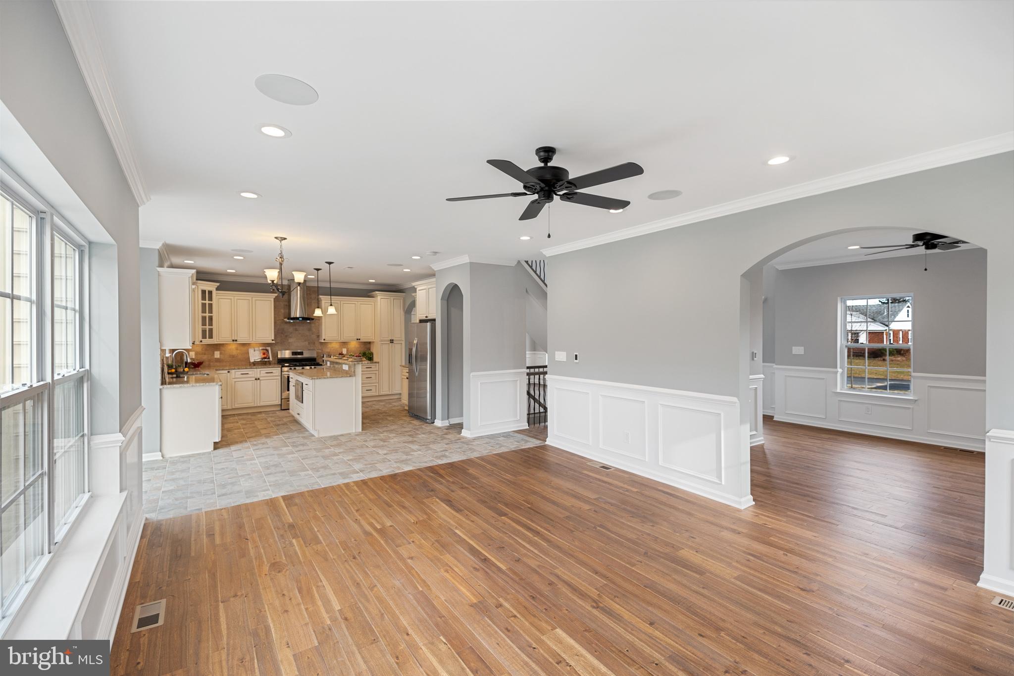 1021 West Maple Avenue Langhorne, PA 19047 - Photo 33 of 37 a view of a living room a kitchen and a wooden floor