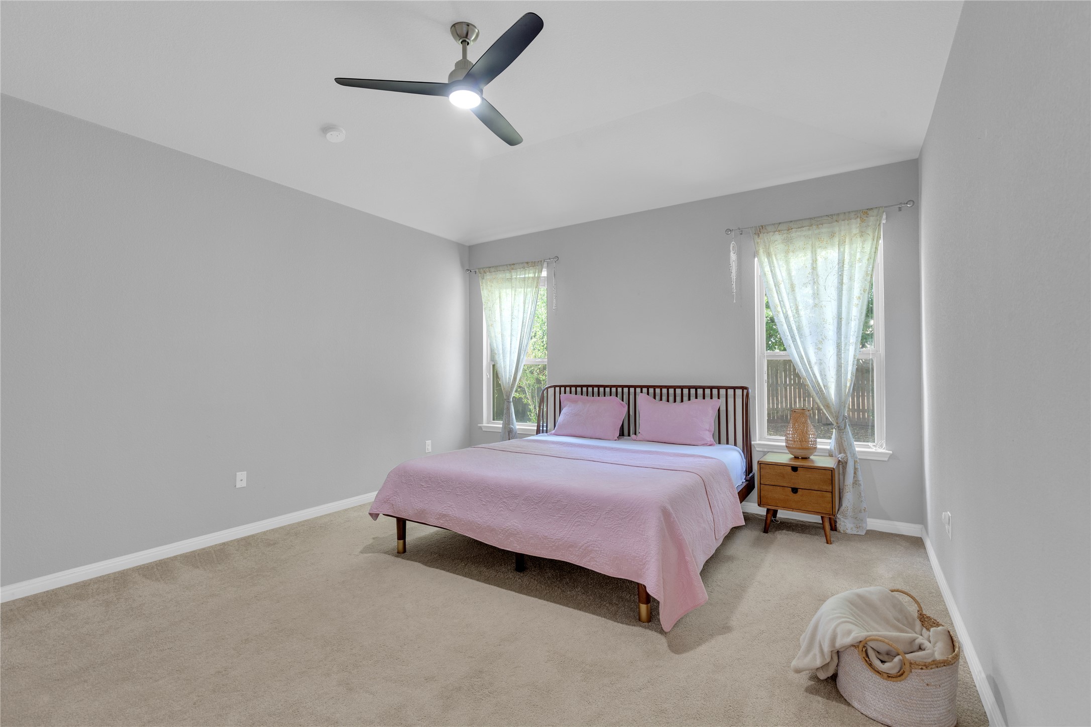 721 Schefer Street Leander, TX 78641 - Photo 17 of 38 a bedroom with a bed and a window