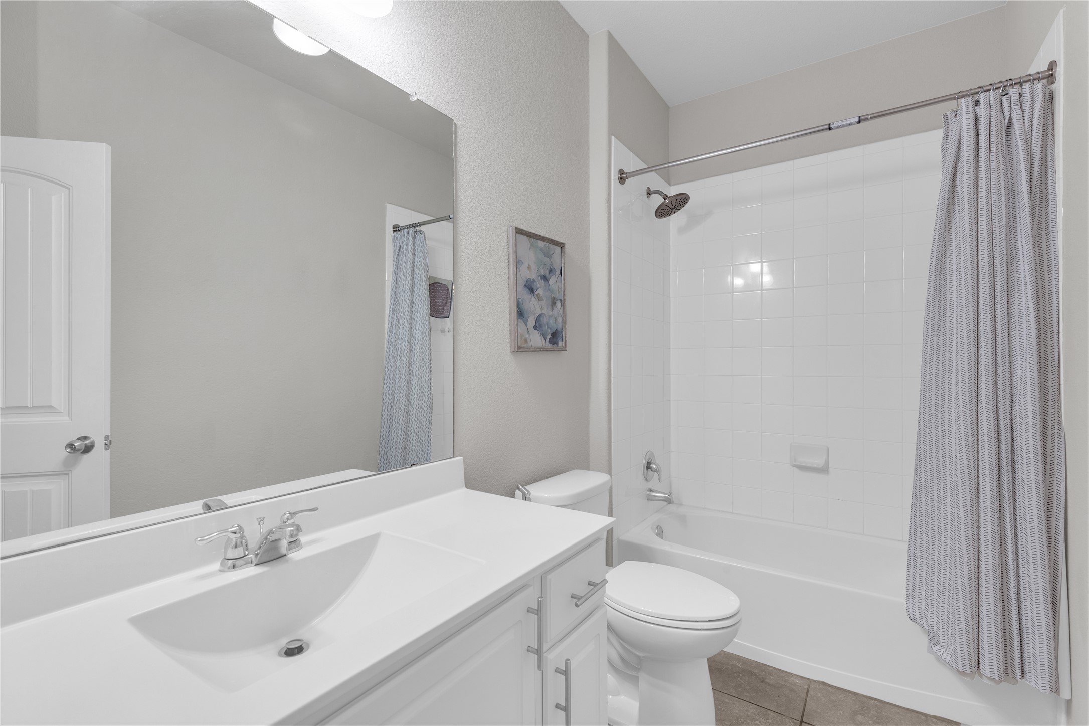 721 Schefer Street Leander, TX 78641 - Photo 22 of 38 a bathroom with a sink a toilet and shower