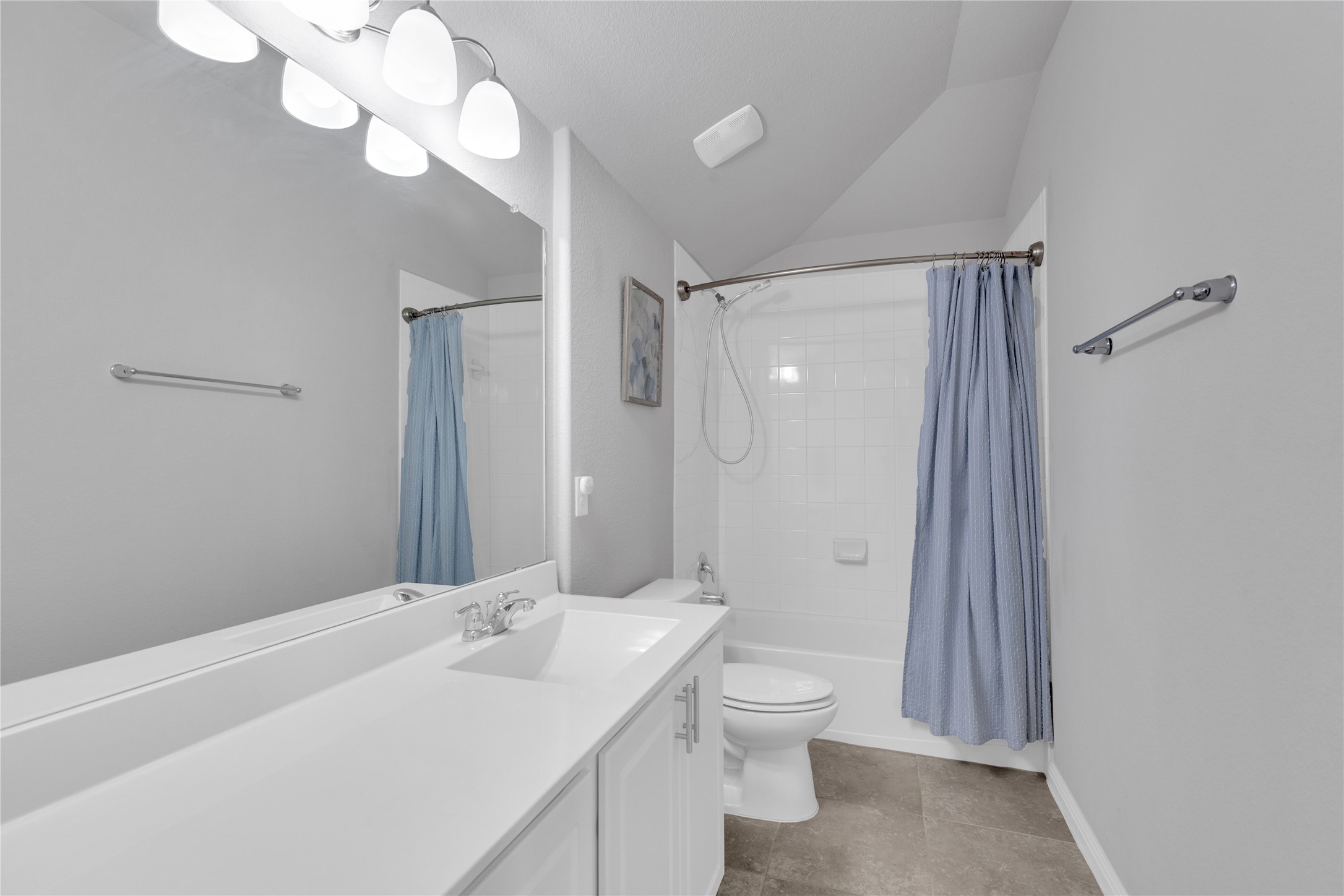 721 Schefer Street Leander, TX 78641 - Photo 29 of 38 a bathroom with a double vanity sink mirror and toilet