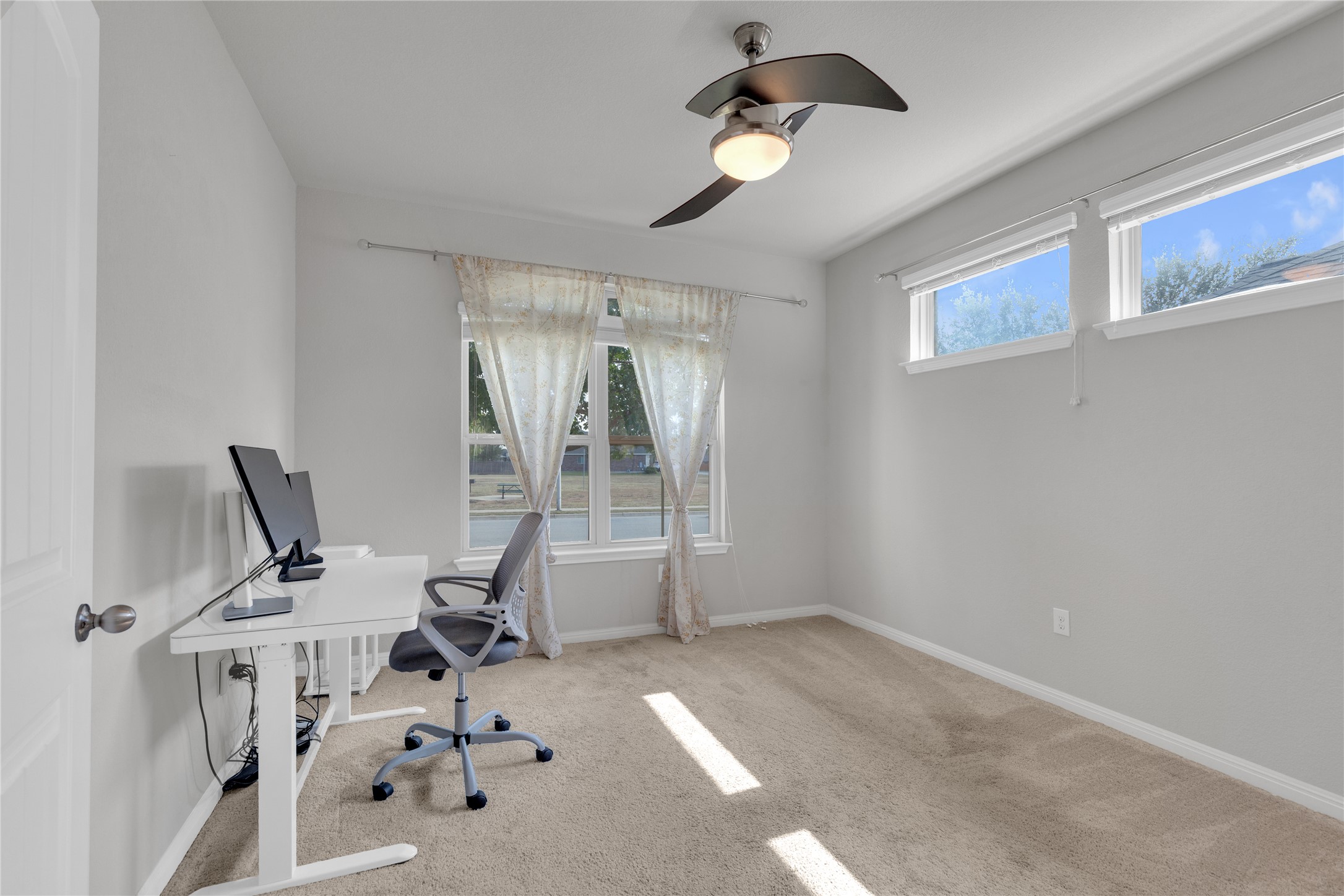 721 Schefer Street Leander, TX 78641 - Photo 3 of 38 a view of a room with gym equipment