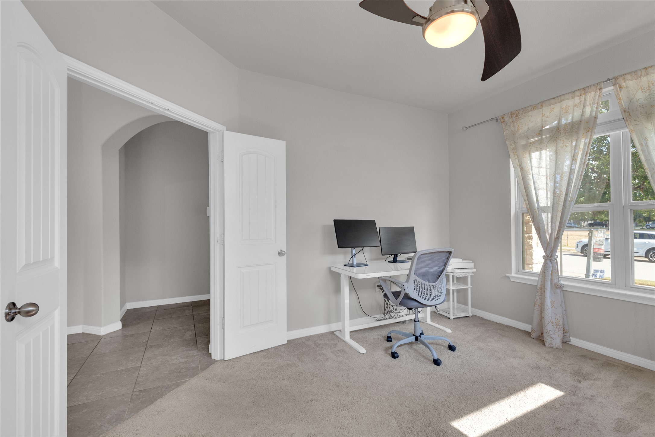 721 Schefer Street Leander, TX 78641 - Photo 4 of 38 a work room with furniture and a window