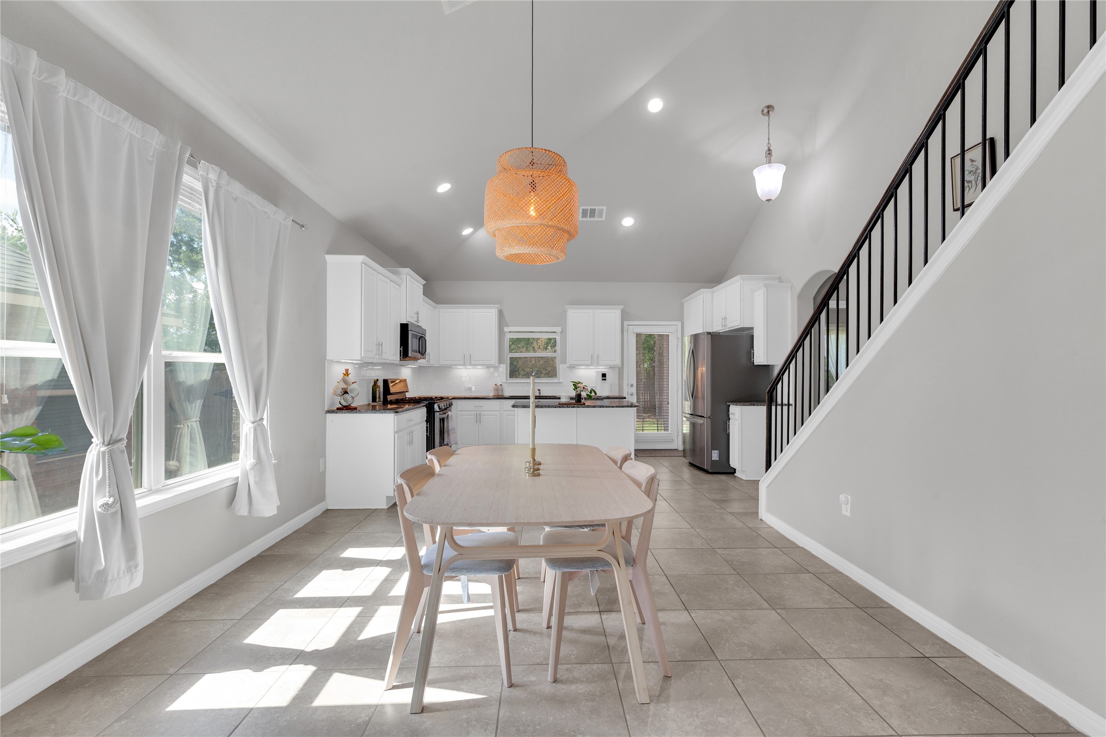 721 Schefer Street Leander, TX 78641 - Photo 8 of 38 a view of kitchen with cabinets and wooden floor