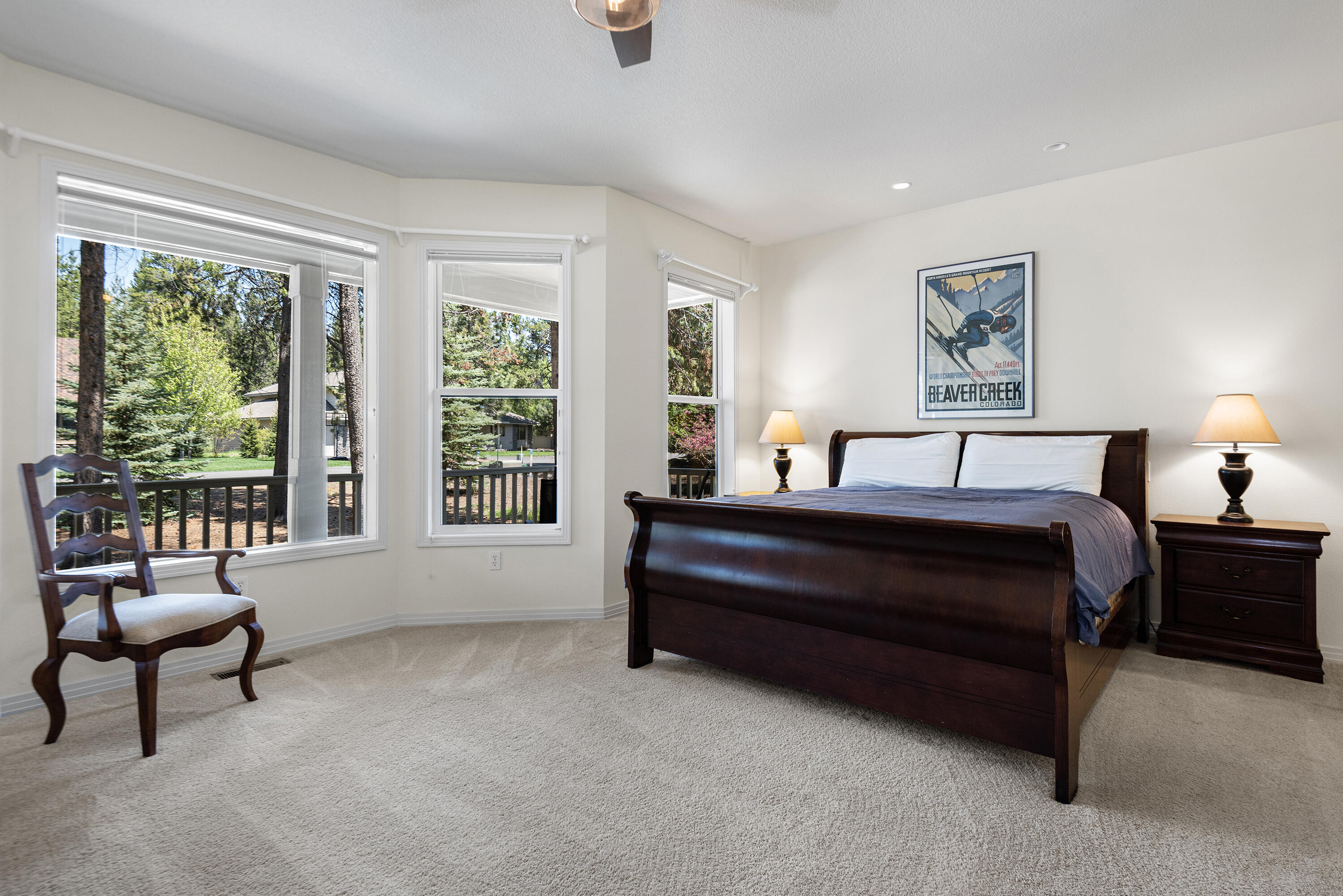 16775 Pony Express Way Bend, OR 97707 - Photo 11 of 38 a bedroom with a bed and a large window