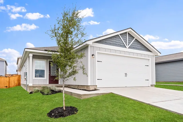 a front view of house with yard