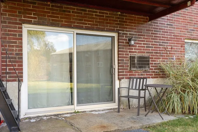 a view of a door and a chair