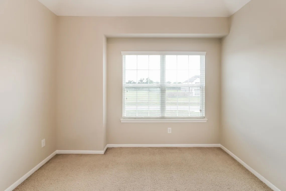 1538 Lakeland Circle Rosharon, TX 77583 - Photo 11 of 12 an empty room with a window