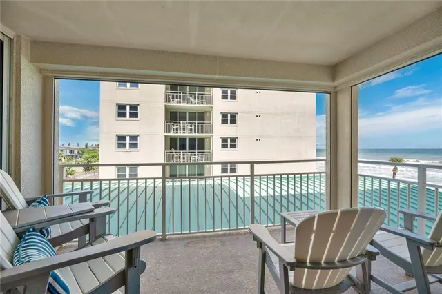 a view of a chair in the balcony