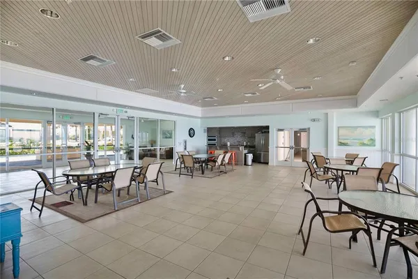 a view of a dining room with furniture and a livingroom