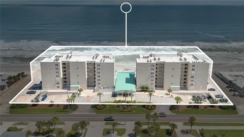 a view of swimming pool from a balcony