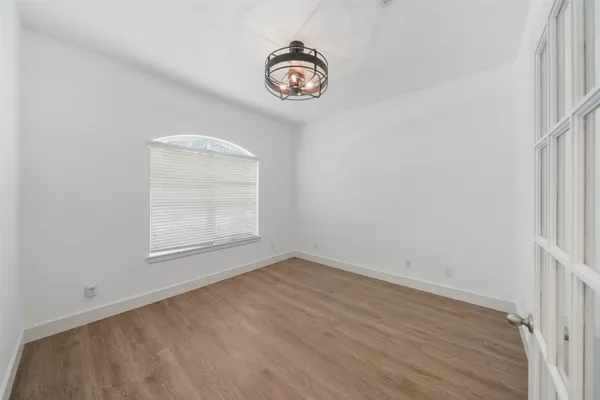 an empty room with a door