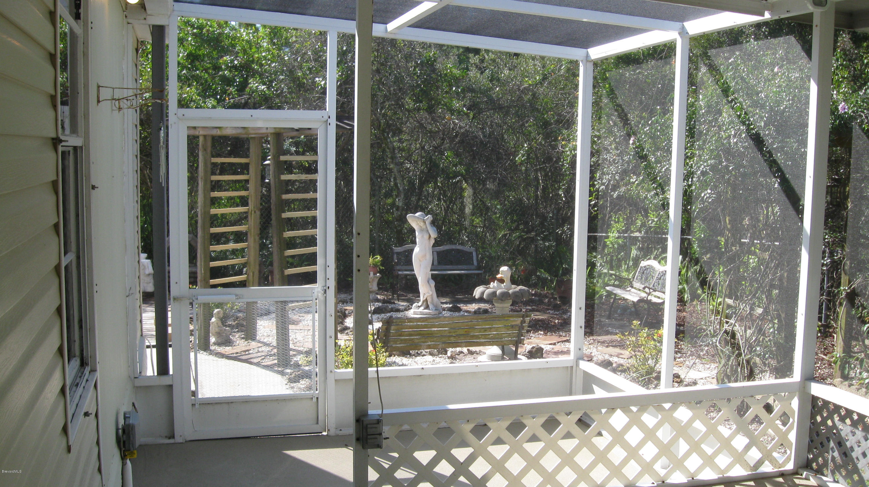 565 Baker Road Merritt Island, FL 32953 - Photo 8 of 21 screened back patio