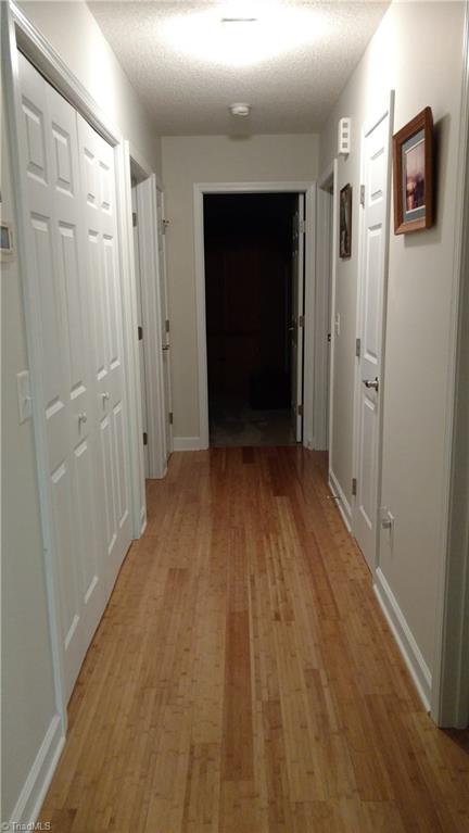 943 Neely Road Asheboro, NC 27205 - Photo 10 of 15 Hall features Beautiful Bamboo Floors and Laundry Area