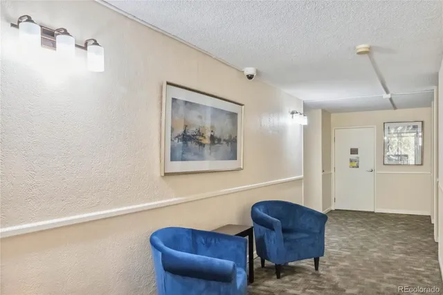 a view of livingroom with furniture and windows