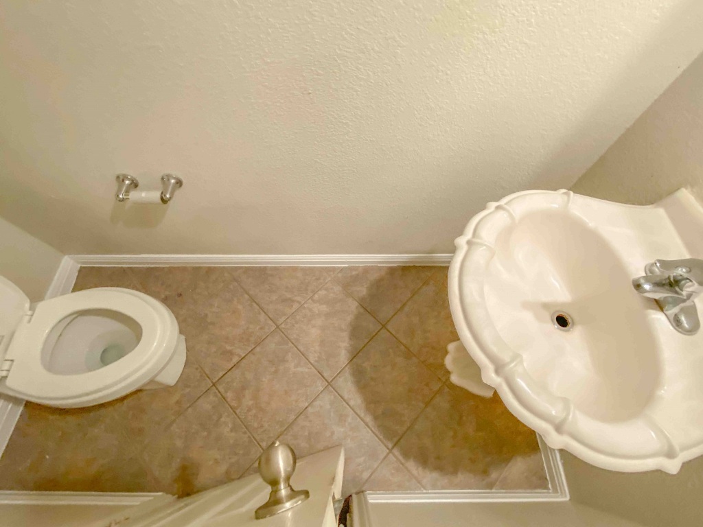 609 West 37th Street Austin, TX 78705 - Photo 13 of 38 a bathroom with a sink and a mirror