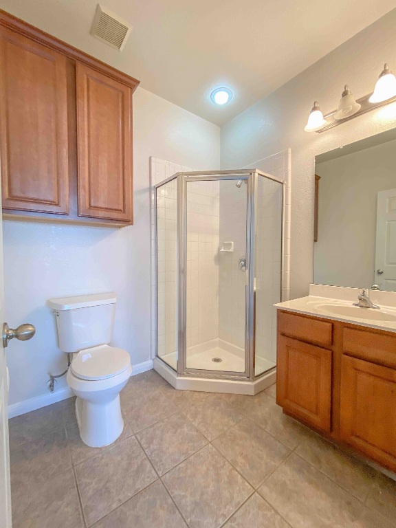 609 West 37th Street Austin, TX 78705 - Photo 28 of 38 a bathroom with a granite countertop sink and a mirror