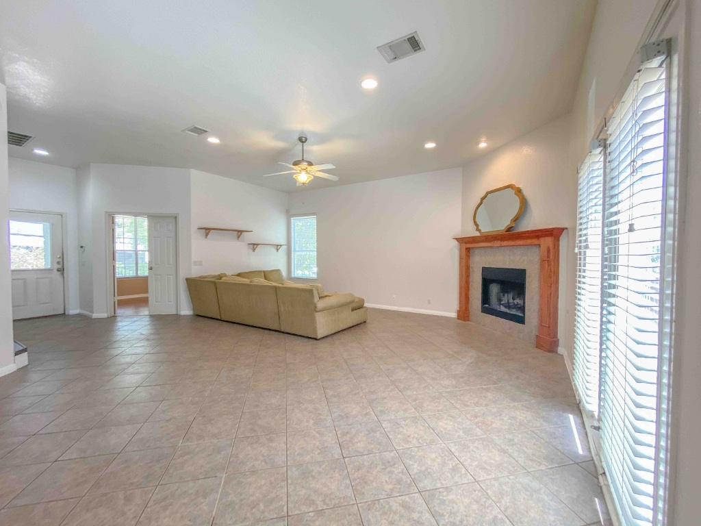 609 West 37th Street Austin, TX 78705 - Photo 6 of 38 a living room with furniture and a fireplace