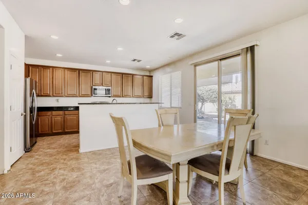 a view of a dining room with furniture