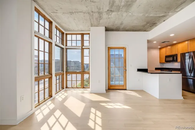 a view of an entryway with a kitchen