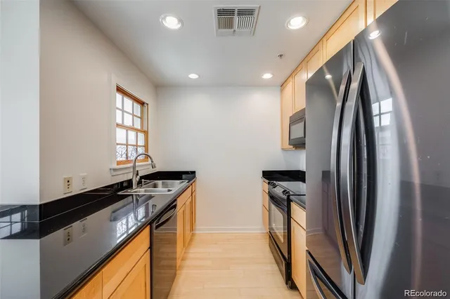 a bathroom with a sink and a microwave