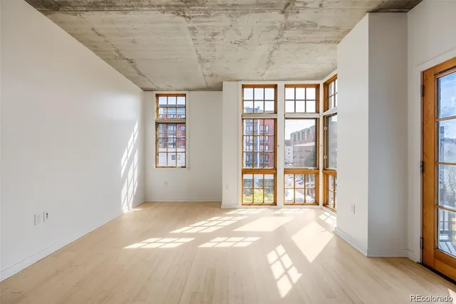 an empty room with windows