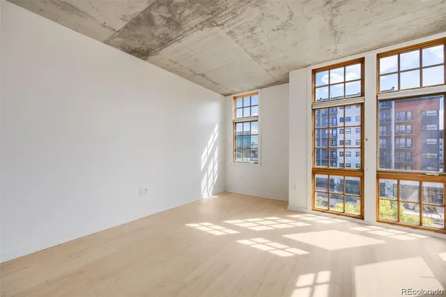 a view of a house with wooden deck