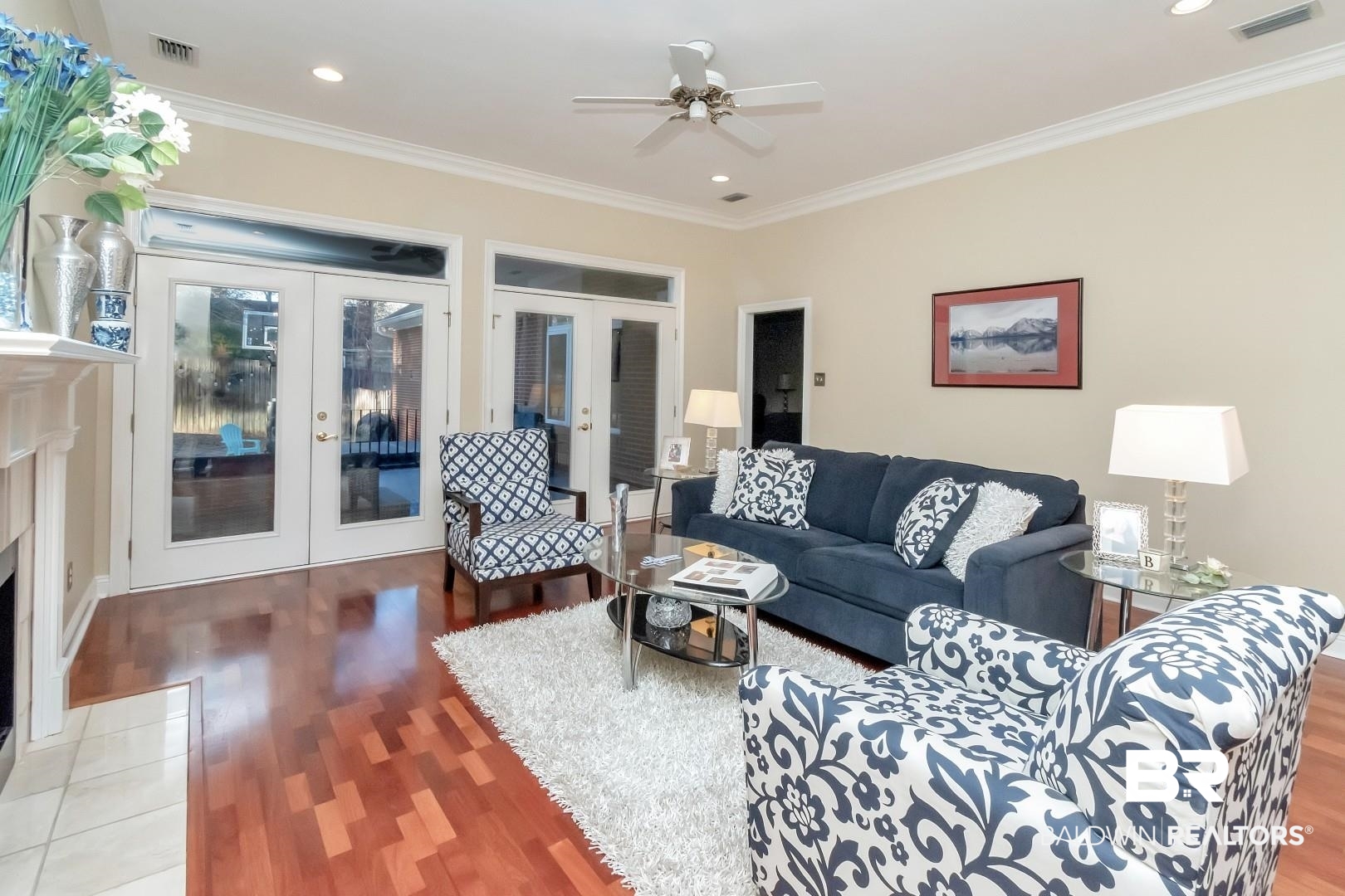 1050 Southern Way Court Mobile, AL 36609 - Photo 5 of 36 Living room featuring crown molding, wood-type flooring, french doors, and ceiling fan
