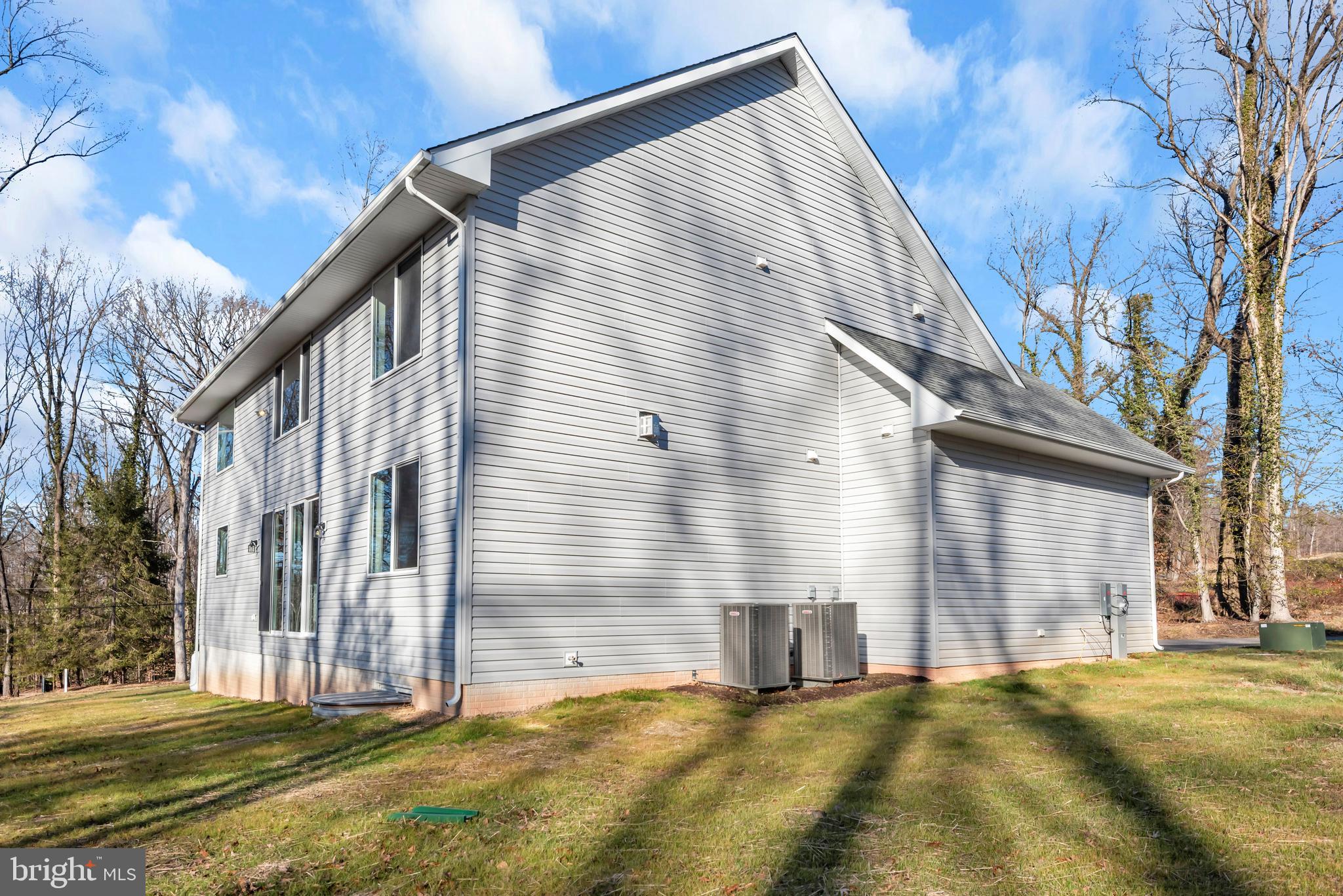 6502 Whitetail Xing Way Hanover, MD 21076 - Photo 45 of 58 a view of a house with a yard