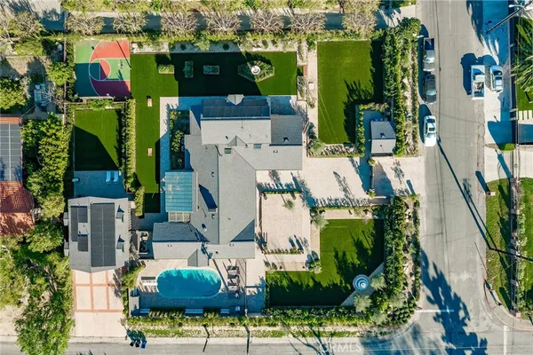 an aerial view of houses with outdoor space