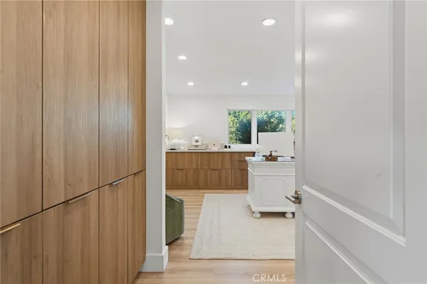 a bathroom with a sink a mirror and a shower