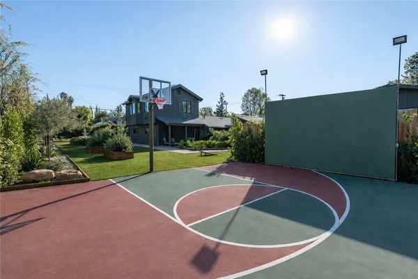 a front view of a house with swimming pool