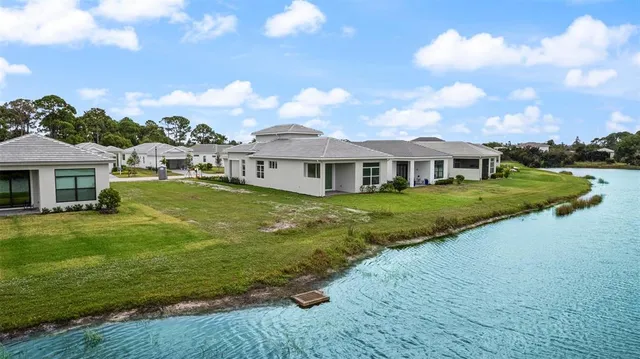 a view of a house with a big yard