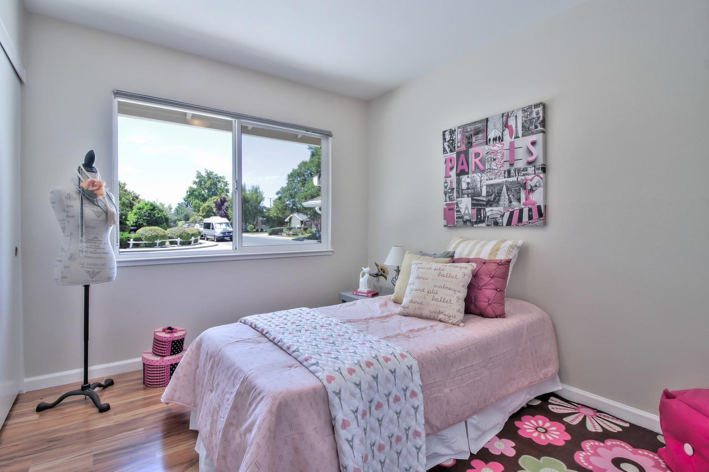 2221 Sutter Avenue Santa Clara, CA 95050 - Photo 15 of 29 a bedroom with a bed and a painting on the wall