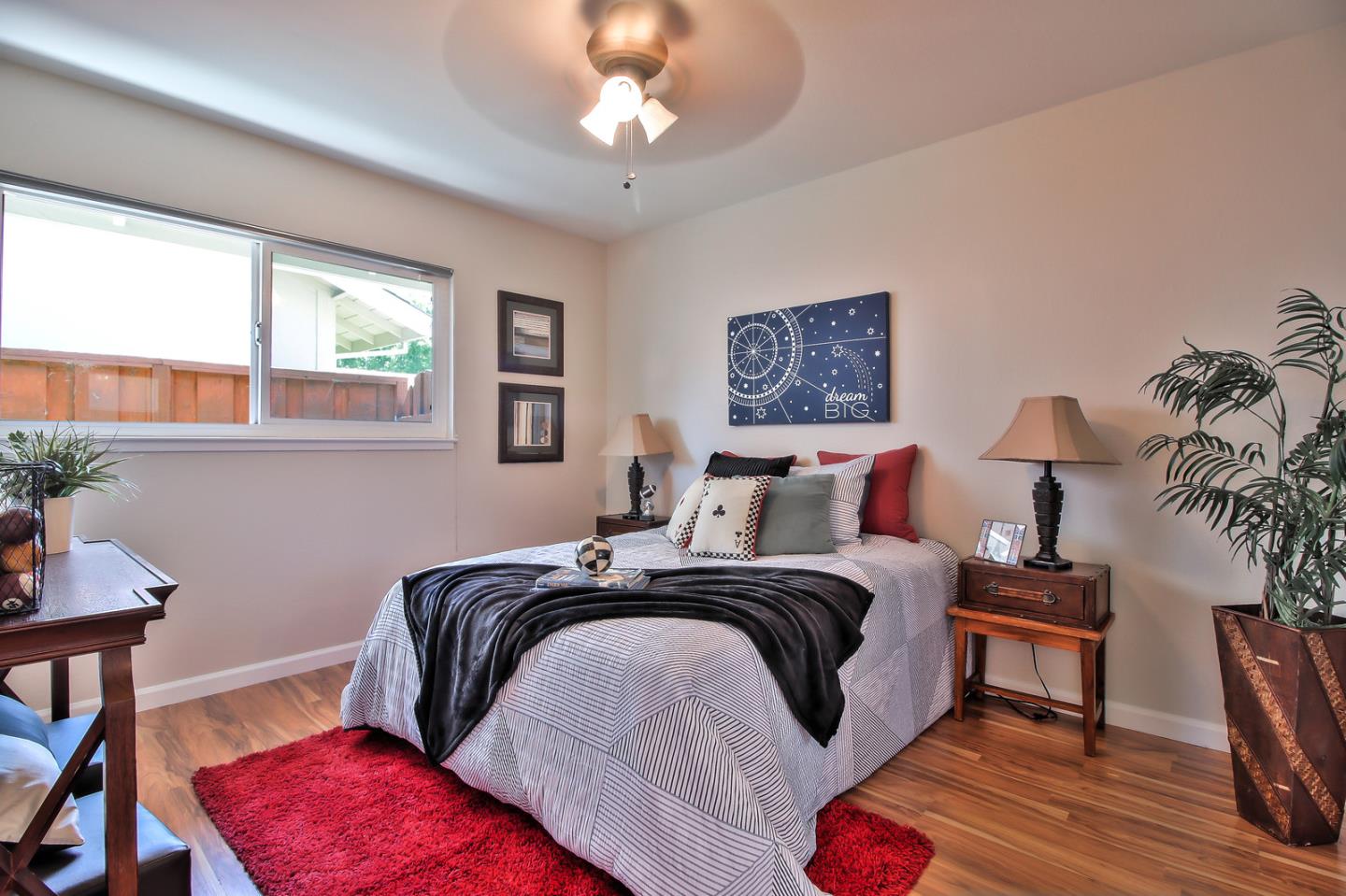 2221 Sutter Avenue Santa Clara, CA 95050 - Photo 16 of 29 a bedroom with bed and a window