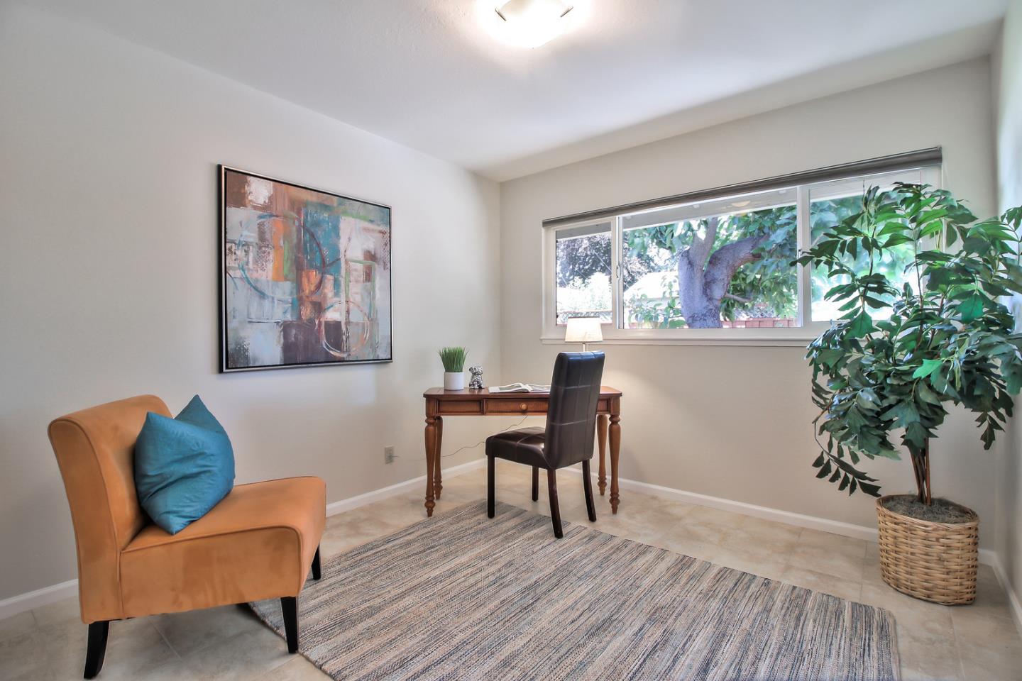 2221 Sutter Avenue Santa Clara, CA 95050 - Photo 17 of 29 a workspace with furniture and a potted plant