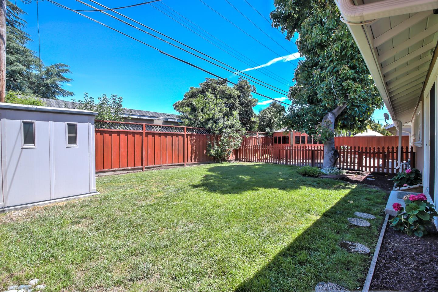 2221 Sutter Avenue Santa Clara, CA 95050 - Photo 20 of 29 a view of a backyard with garden
