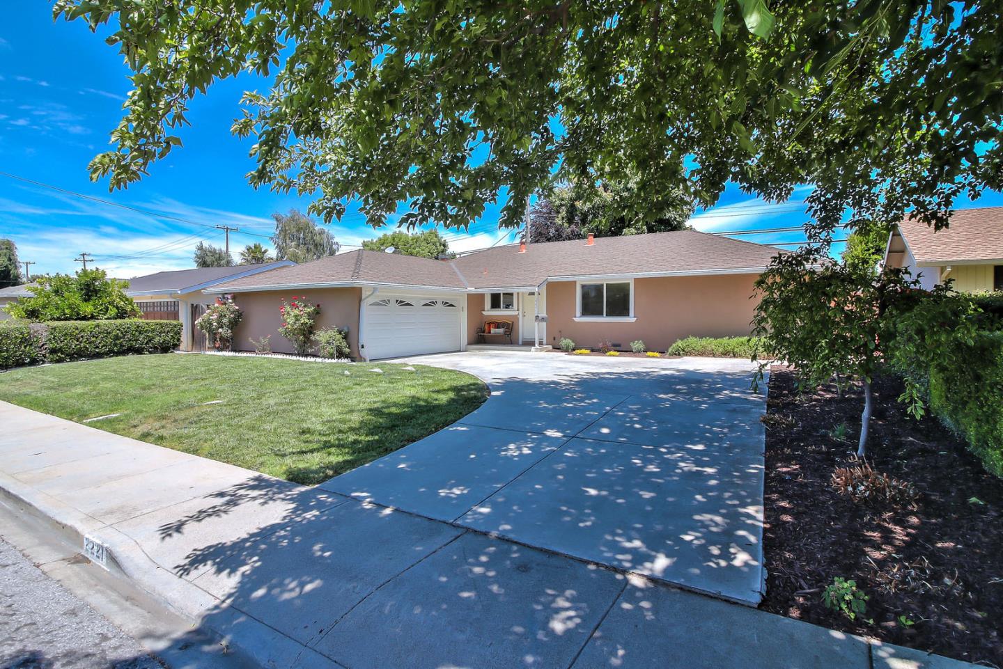 2221 Sutter Avenue Santa Clara, CA 95050 - Photo 2 of 29 a front view of a house with garden
