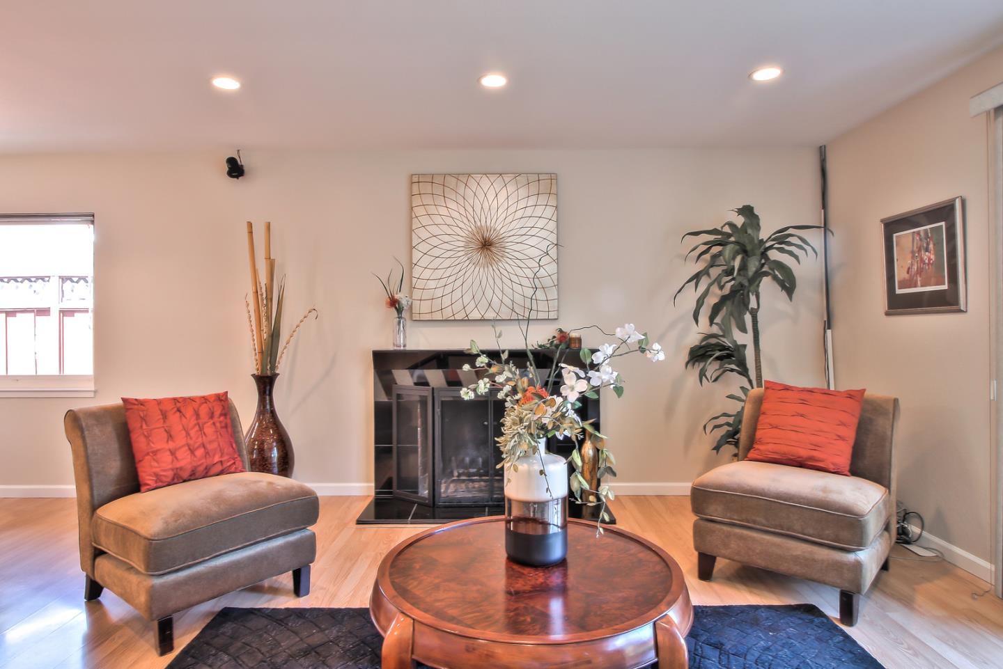 2221 Sutter Avenue Santa Clara, CA 95050 - Photo 7 of 29 a living room with furniture potted plant and a chandelier
