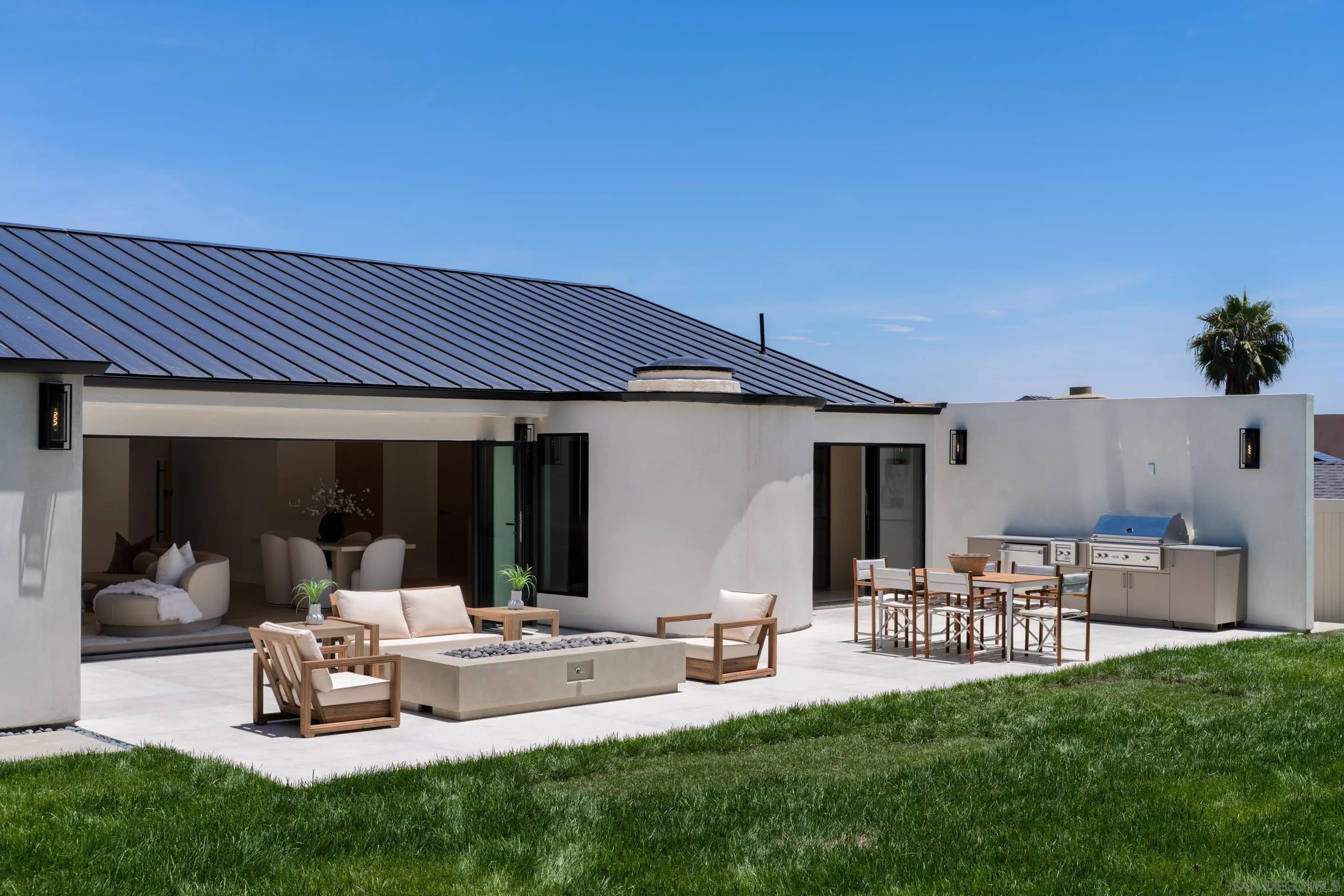 5826 Soledad Mountain Road La Jolla, CA 92037 - Photo 33 of 52 a view of a house with backyard and sitting area