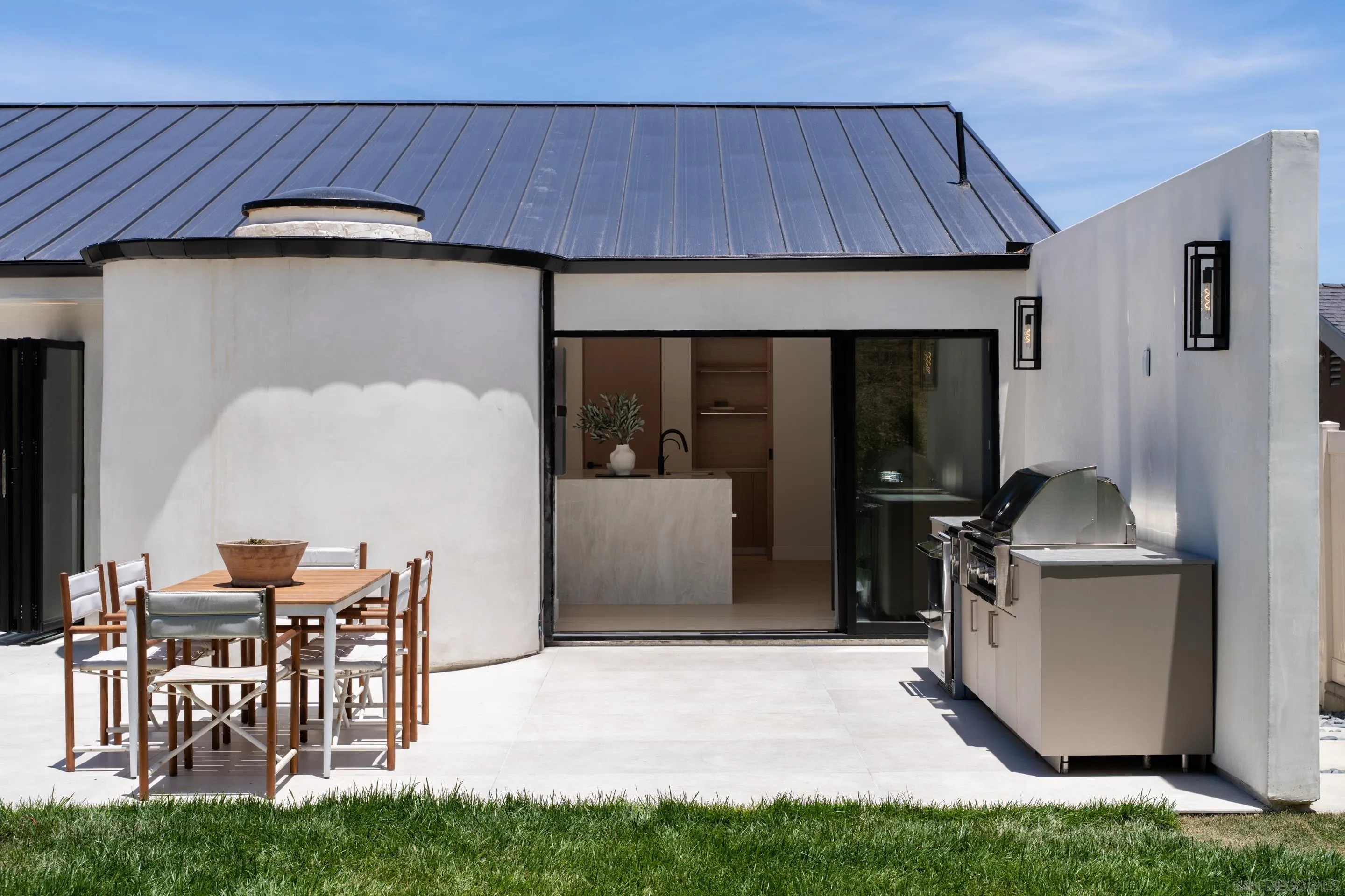 5826 Soledad Mountain Road La Jolla, CA 92037 - Photo 36 of 52 a living room with furniture and a wooden floor
