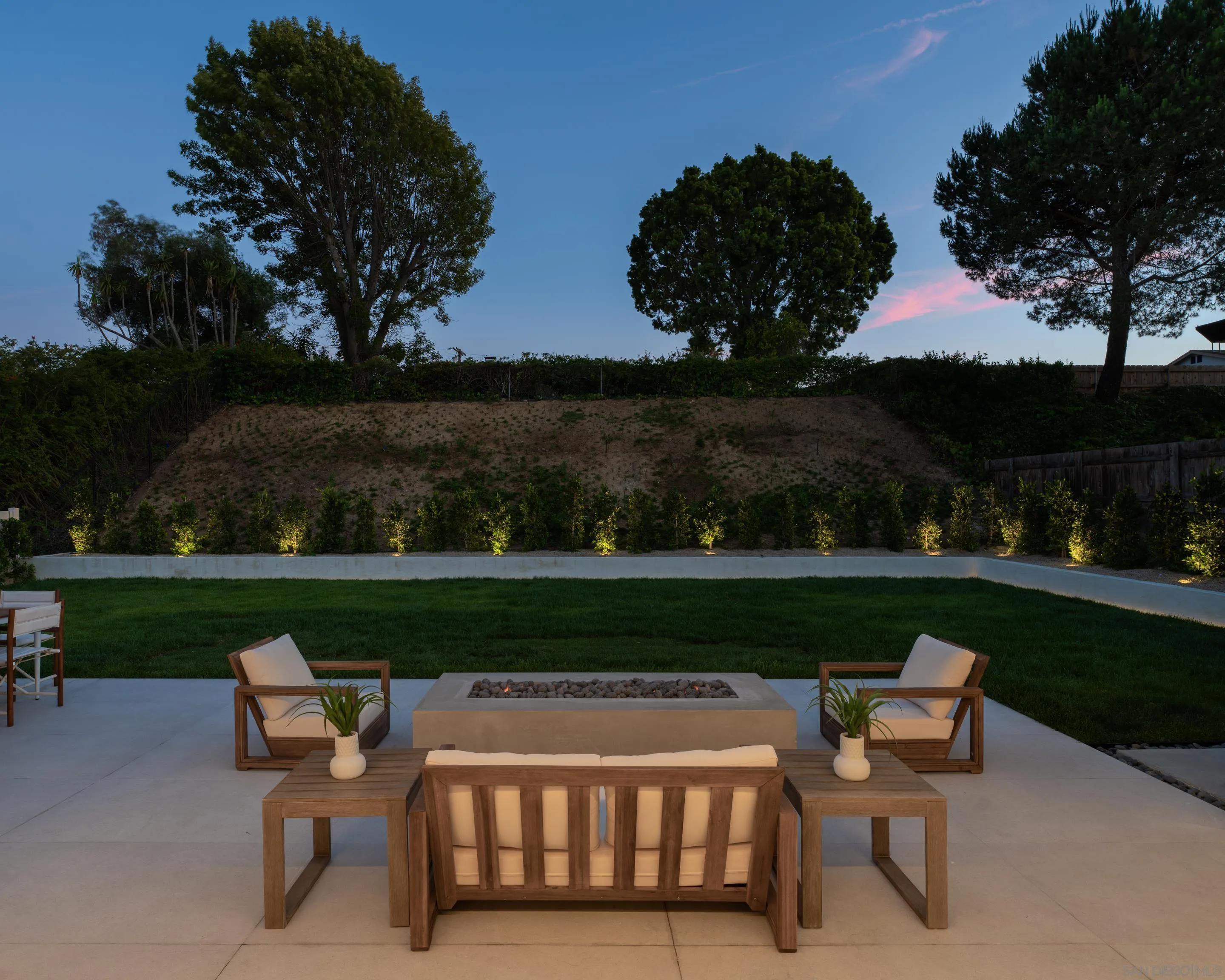 5826 Soledad Mountain Road La Jolla, CA 92037 - Photo 37 of 52 a view of a table and chairs in the garden